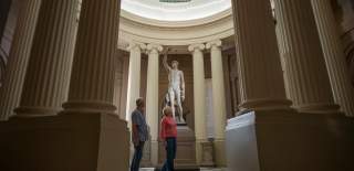 A couple explore Lady Lever Art Gallery in Port Sunlight.