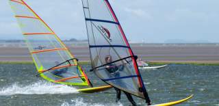 Windsurfers windsurfing West Kirby