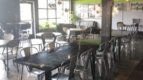 Open tables at Perk City Coffee await Knoxville's coffee aficionados.