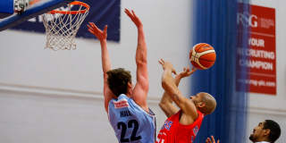 Bristol Flyers basketball players in a match against the Manchester Giants at SGS College Bristol - credit JMP Photography