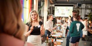 People talking at food and drink event - credit Charlotte Tolhurst