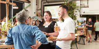 People talking at food and drink event - credit Charlotte Tolhurst