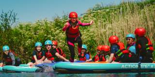 Group stand up paddle boarding - credit Mendip Activity Centre