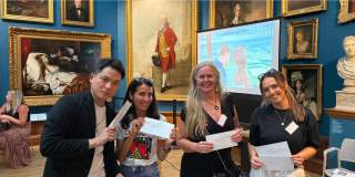 People will envelopes at Summer In Bath media event 2025