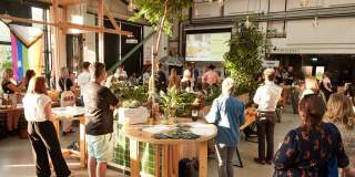 People watching presenation at food and drink event in brewery taproom - credit Charlotte Tolhurst