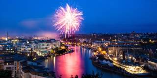 Fireworks over Bristol's Harbourside at night during the Bristol Harbour Festival - credit Chris Bahn