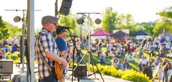 Band singing and crowd enjoying HartFest