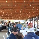 People enjoying food at the VIP section of Galway Downs