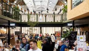 People exploring inside Campfield Market, Manchester