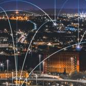 An ariel view of Bristol with lines of light connecting the buildings