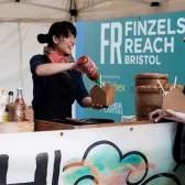 Shoppers at a stand in Finzels Reach - credit Rupert Marlow Photography