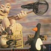 A still of the famous Claymation characters Wallace & Gromit chasing a penguin in the 1993 film The Wrong Trousers - credit Aardman Animations