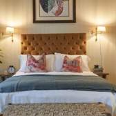 A large bed in a bedroom at The Langford - Credit The Langford