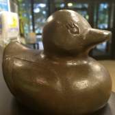 This is a picture of a bronze lucky duck for the Lucky Duck Scavenger Hunt in Huntsville