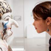 Young girl staring at sculpture, Nanaimo Art Gallery