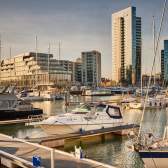 Boats moored at Ocean Village on an sunset evening