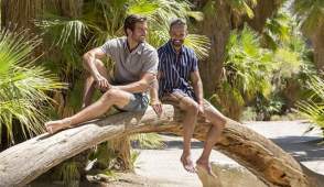 two men on tree in Palm Canyon