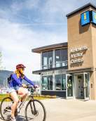 Biking by the Kelowna Visitor Centre