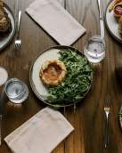 Overhead shot of a table with plates of food