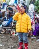 A Child Enjoying a Mardi Gras Parade