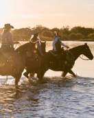 people riding horses