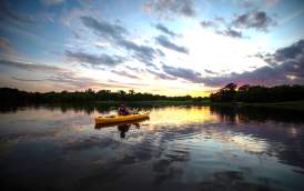 Visitors kayaking on Waterloo Lake in Denison, Texas