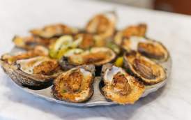 Chargrilled Oysters - Dickie Brennan's Bourbon House