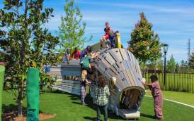 A group of hildren Play on the coastal Louisiana-inspired play equipment at the Goldring Woldenberg Riverfront Park in New Orleans, adjacent to the French Quarter.
