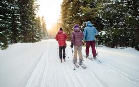 a group of people skiing in the Wyoming snow