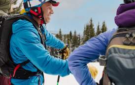Aaron Mulkey and aa group of people on snow skis