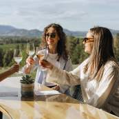 People toasting at Tantalus Vineyards.