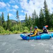 Elyse and Landon kayaking north fork Shoshone river