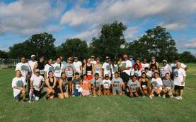 Full group photo of all of the participants of the Unity Fun Run during Juneteenth Celebration.