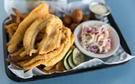 Fried Catfish with slaw, hush puppies and fries - High Hat New Orleans