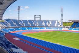 The inside of the Alexander Stadium in Perry Barr, with visible running track and spectator stands