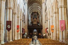 A couple exploring the magnificent Beverley Minster in East Yorkshire