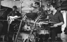 photo of a jazz band playing at the Elephant Room with drummer in foreground