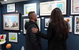 Couple Viewing Art at Art Lovers Gallery