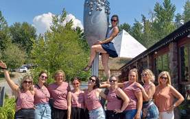 A group of women on a wine tour with A Grape Experience Wine Tours