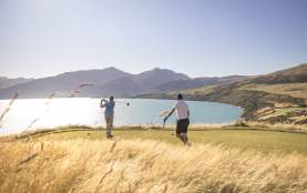 Friends golfing at Jacks Point Course in Summer