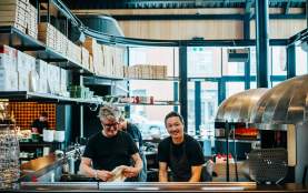 Staff prepping pizza at Pavilion Bar & Kitchens