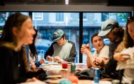 A group of passionate friends repair their beloved Patagonia clothing instore