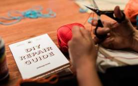 A group of passionate friends repair their beloved Patagonia clothing instore