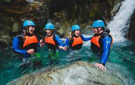 Group of four people in the routeburn canyon