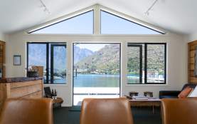 View of Lake Whakatipu from inside the Wet Jacket tasting room at Queenstown Marina