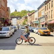 Woman riding bike on Main Street