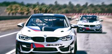 Cars racing along the BMW Performance Center track