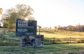 The entryway sign for Stone Barns is pictured.
