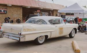 Classic car with The Yellow Rose and Route 66 Decal on it