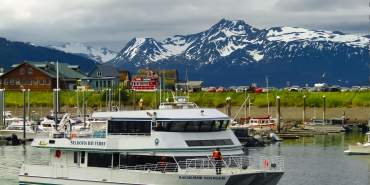 Large%20ferry%20boat%20in%20the%20Seldovia%20Harbor%20with%20snowcapped%20mountains%20in%20the%20background